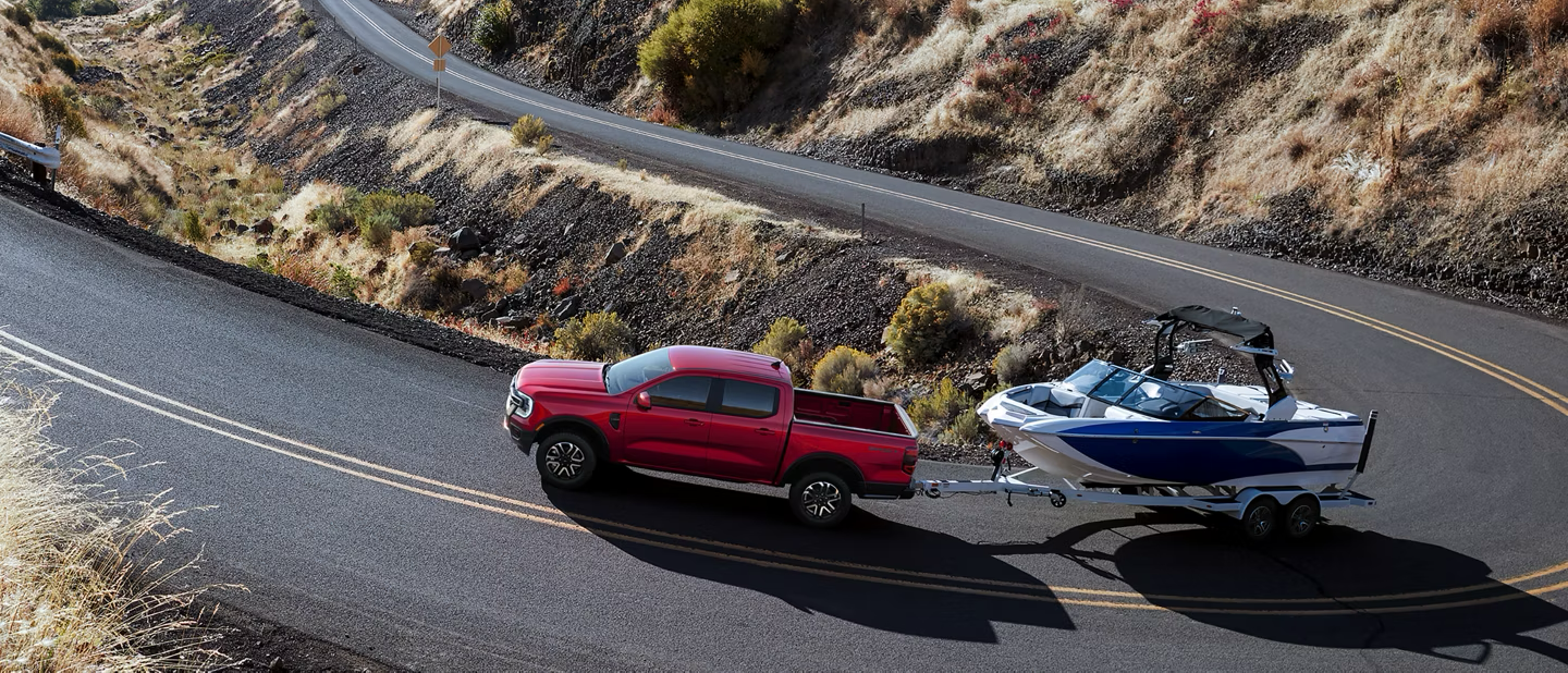 2026 Ford Ranger towing a boat on the water